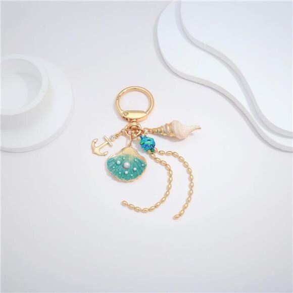 Ocean-Inspired Gold Keychain. - Picture 1 of 5